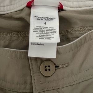 Tan North Face hiking shorts.